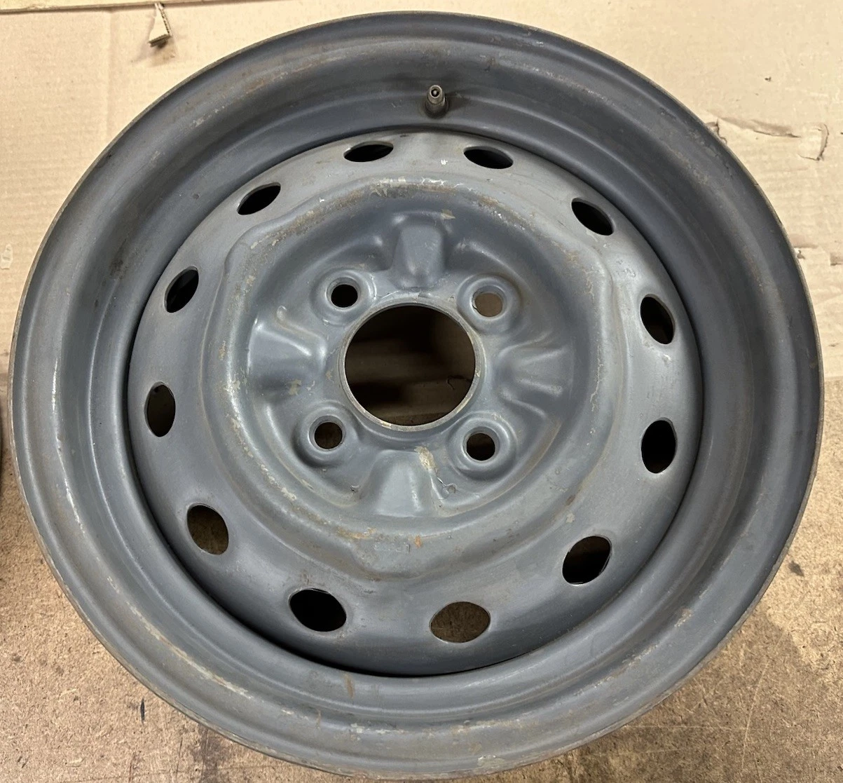 
								MG AHH 8112 MGB GT (EXCLUDING V8) SET OF 4 PERFORATED 5J X 14” STEEL WHEELS full									